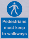 -pedestrians-must-keep-to-walkways-sign~